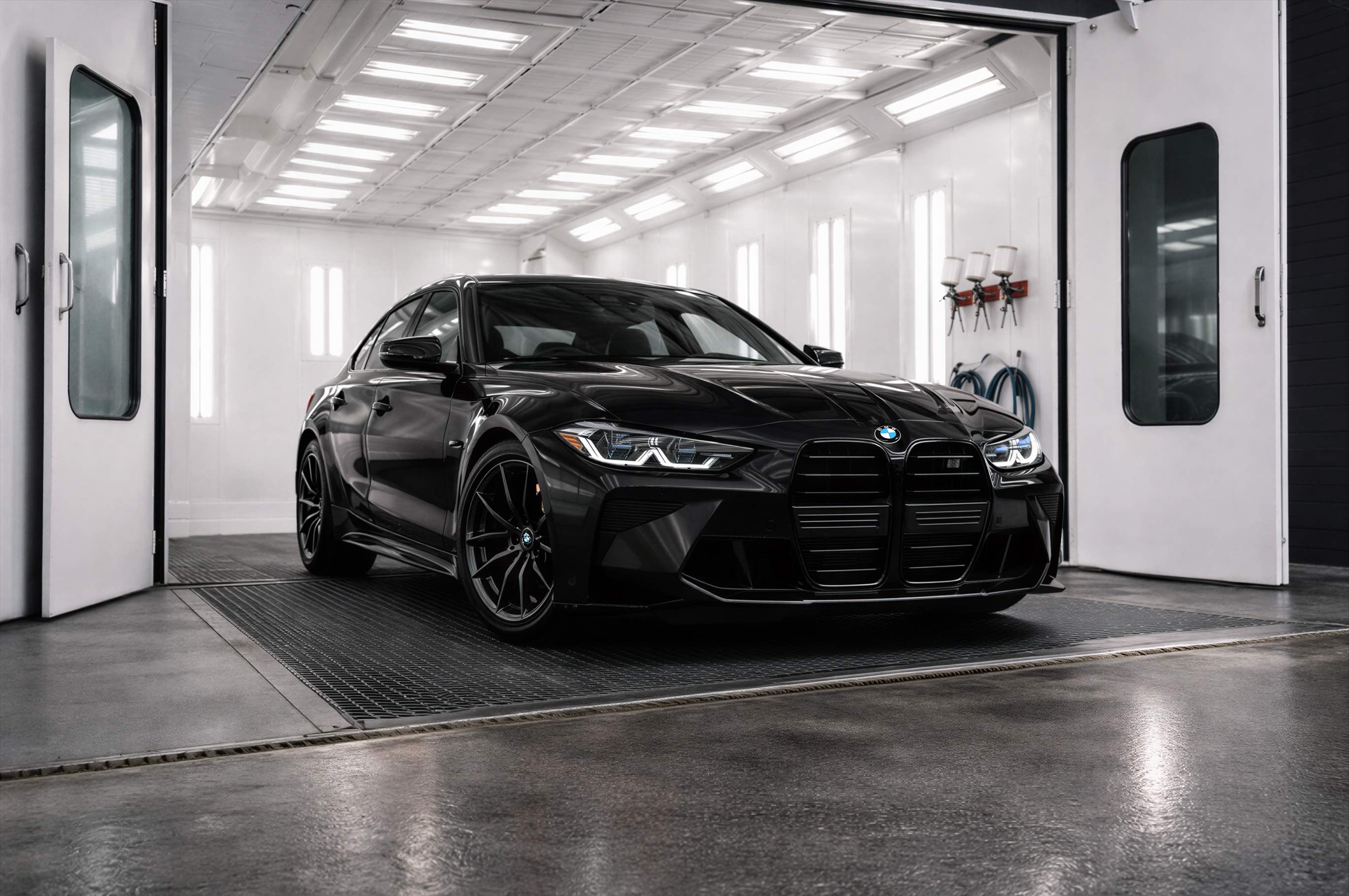 Professional automotive paint refinishing and detailing process at Auto Collision Group Bakersfield