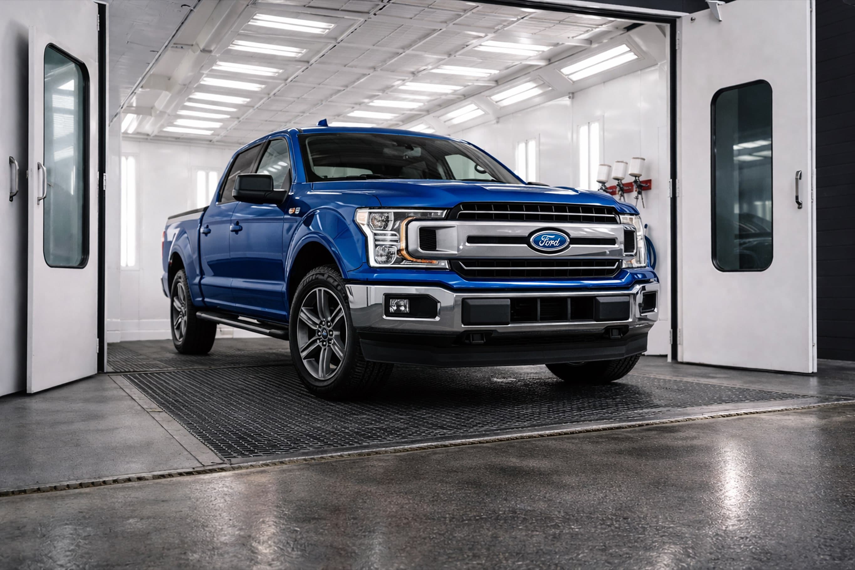 Professional automotive paint refinishing and detailing process at Auto Collision Group Fresno
