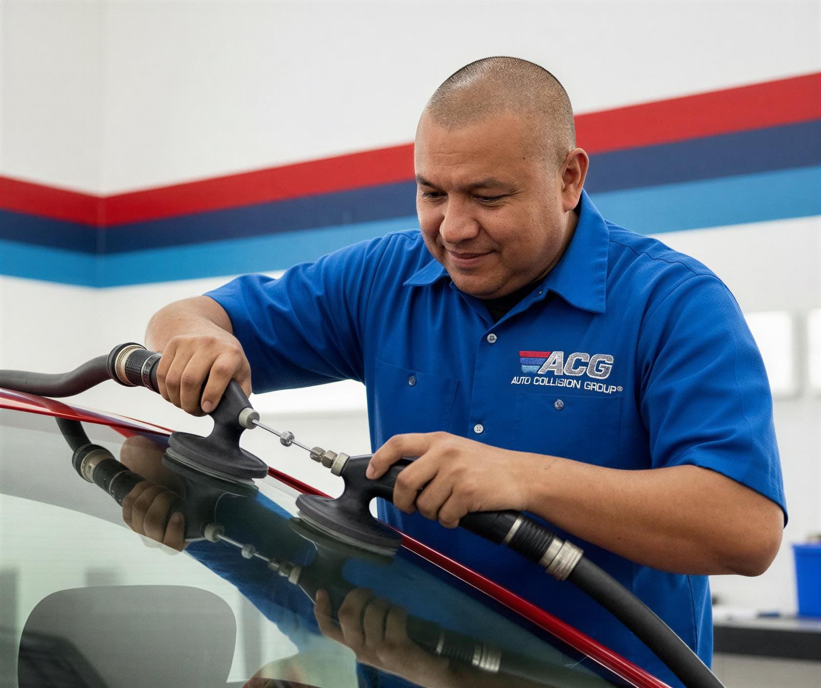 Certified technician performing auto glass and windshield replacement at Auto Collision Group Gardena 2