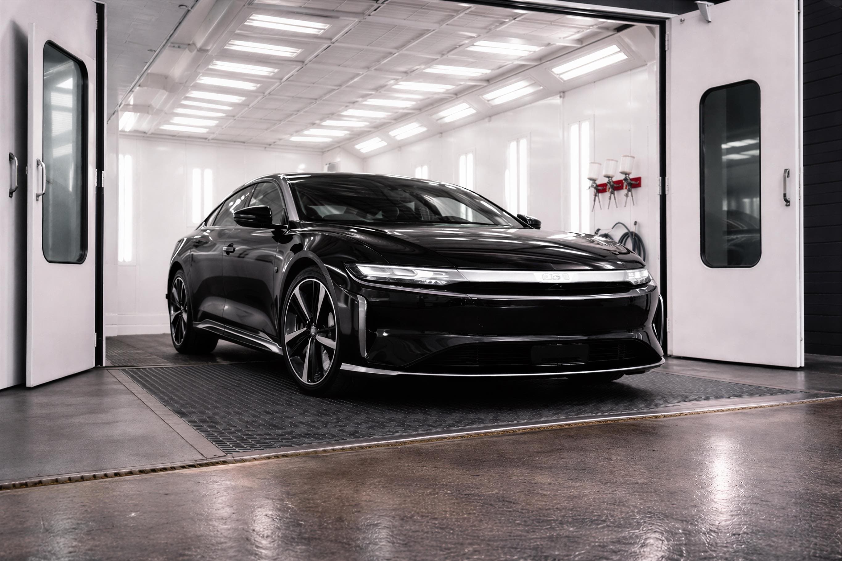 Professional automotive paint refinishing and detailing process at Auto Collision Group Ontario