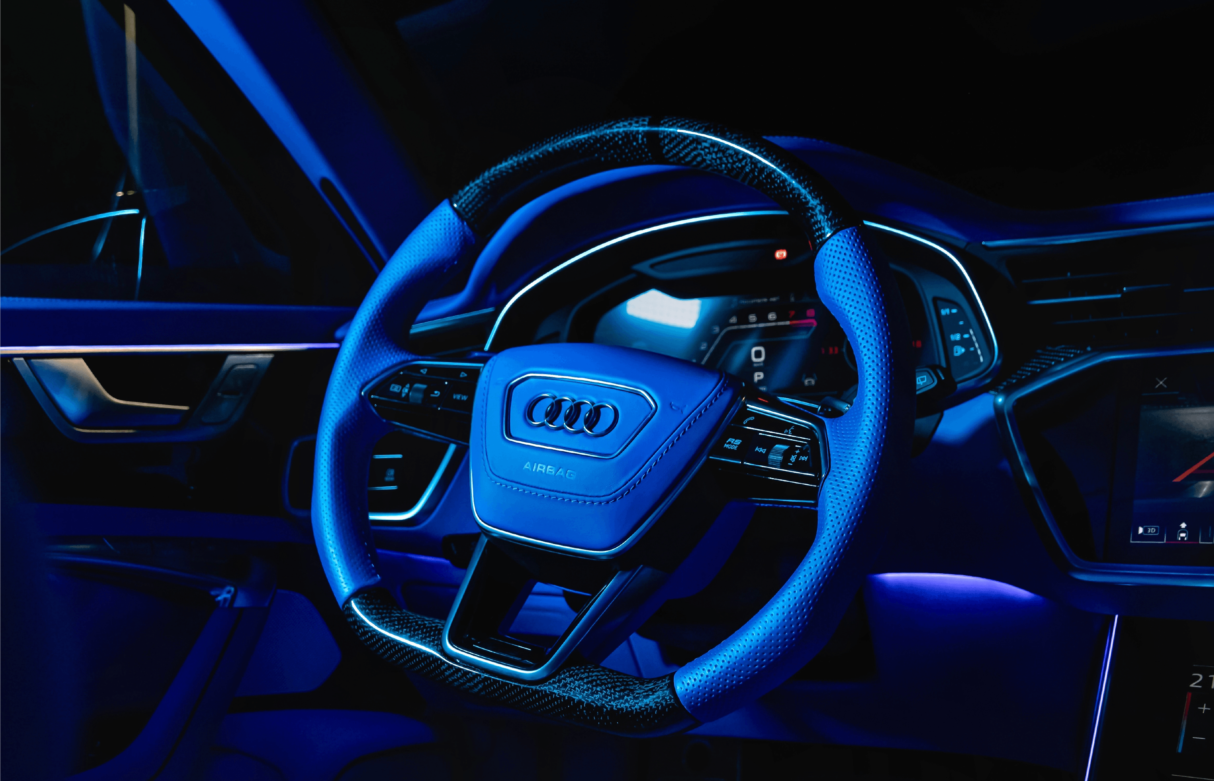 Blue illuminated car steering wheel