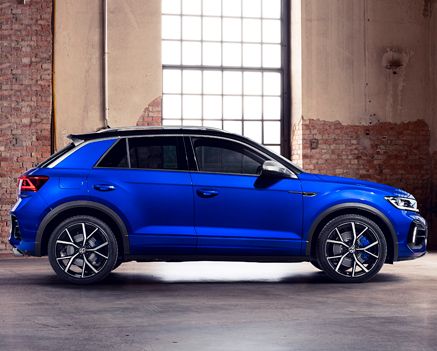 Blue SUV parked in warehouse