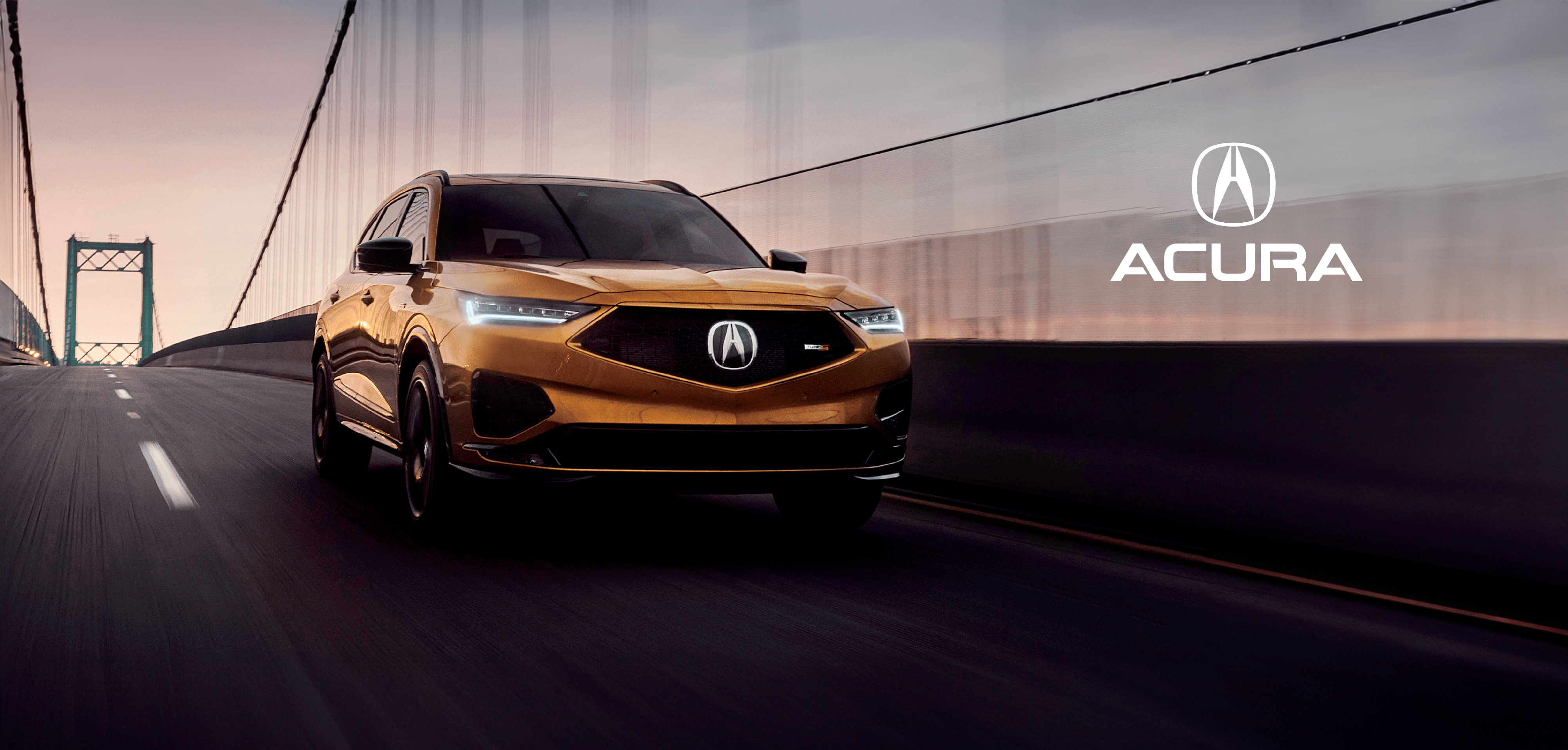 Gold Acura SUV driving bridge