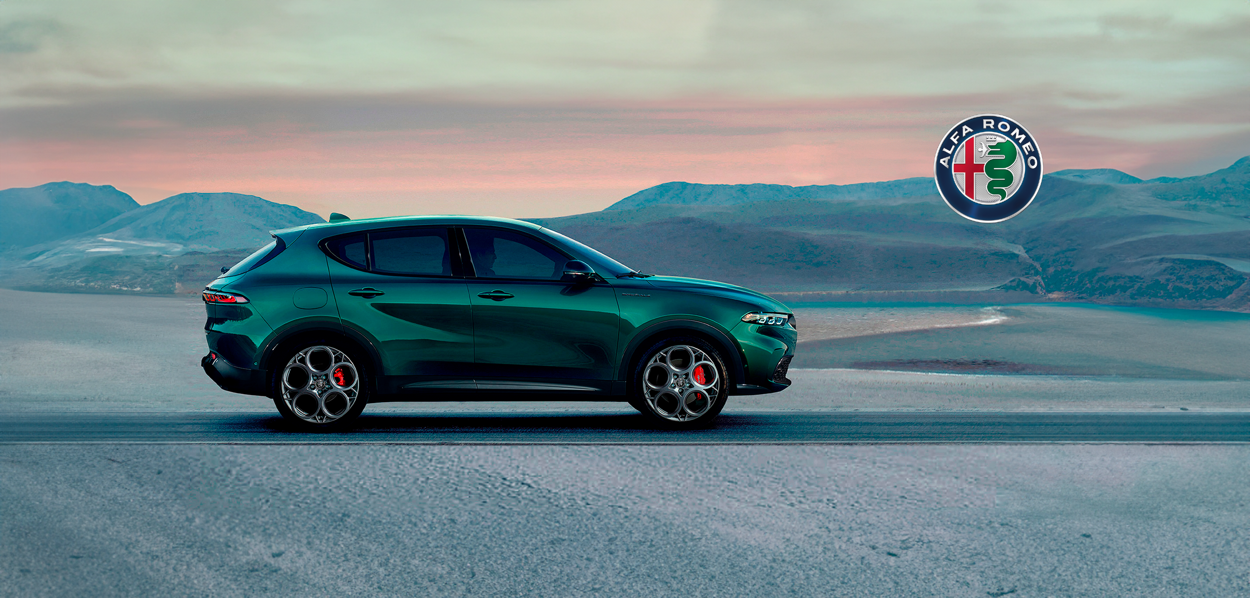 Luxurious green SUV on road