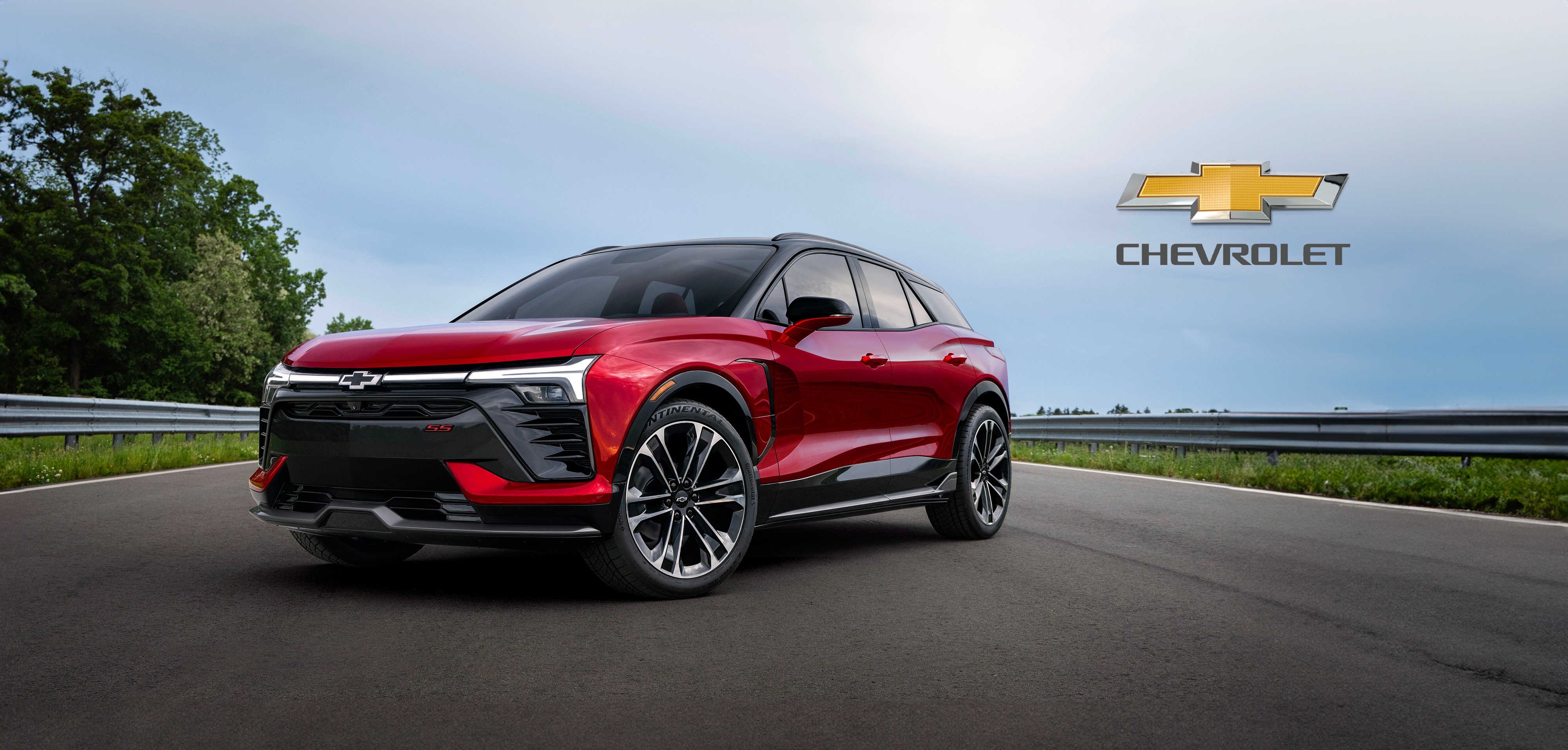 Red Chevrolet SUV on road