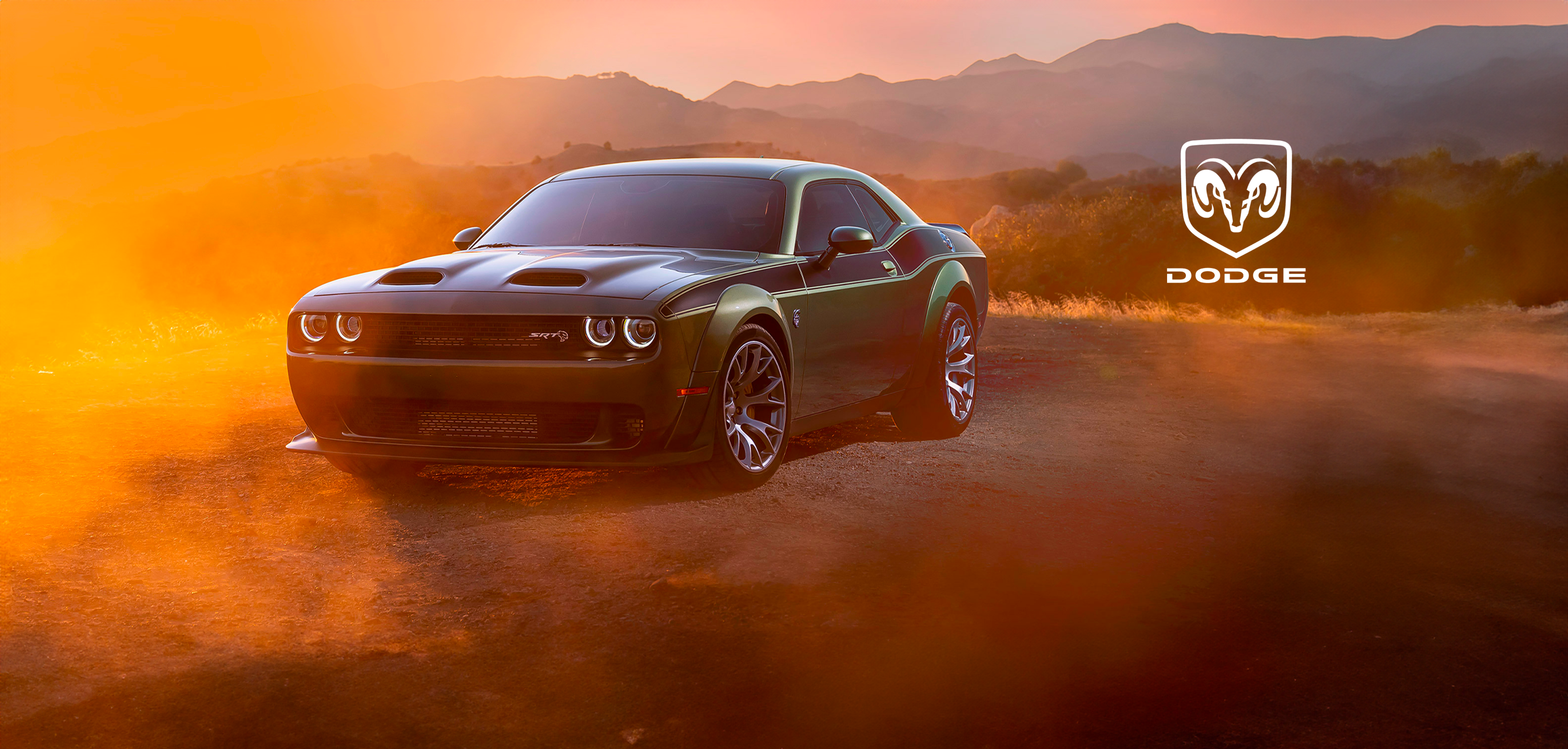 Dodge car in fiery sunset