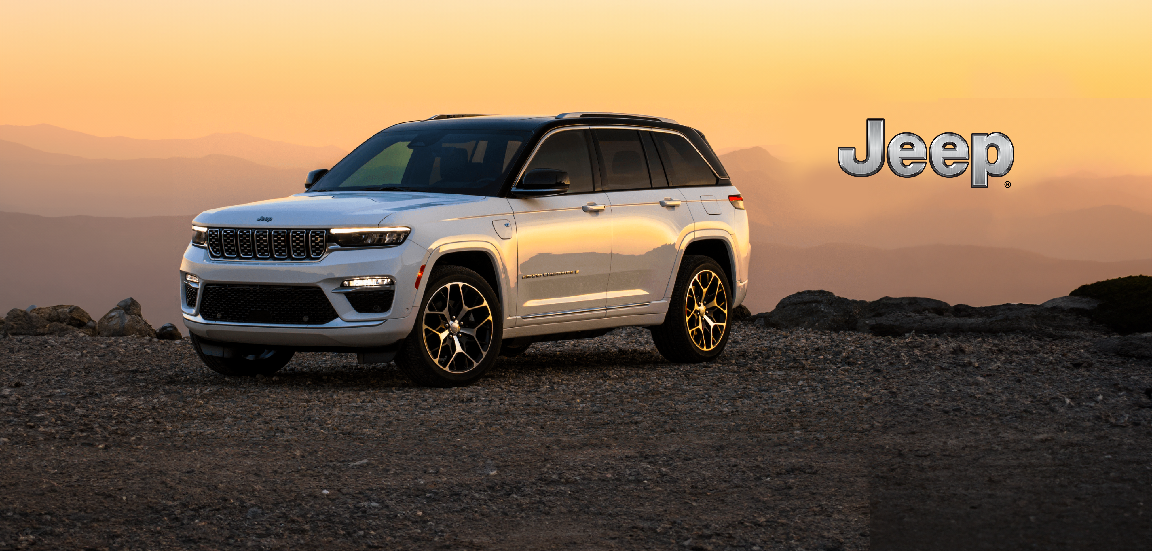 White SUV on rocky terrain