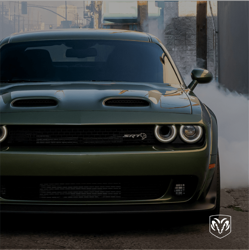 Green Dodge sports car front