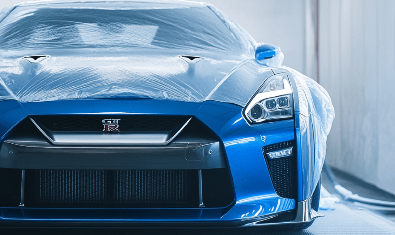 Blue sports car with cover